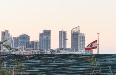 Beirut skyline with Lebanese flag - Lebanon war 2026 | أفق بيروت مع العلم اللبناني - حرب لبنان 2026
