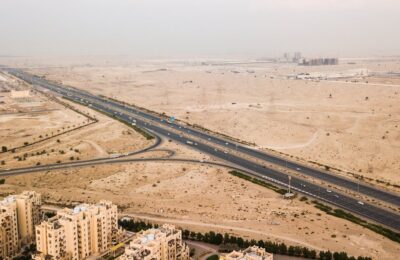oil pipeline desert Saudi Arabia UAE infrastructure aerial view - Photo by The Lazy Artist Gallery