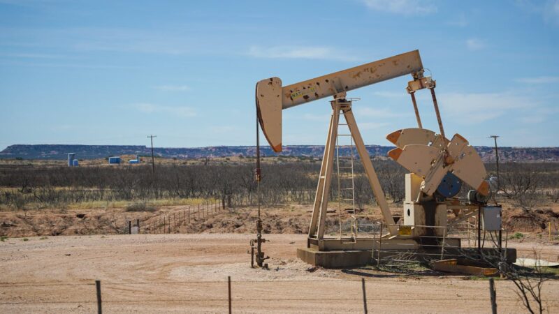 Oil pumpjack extracting crude oil - weekly oil price forecast