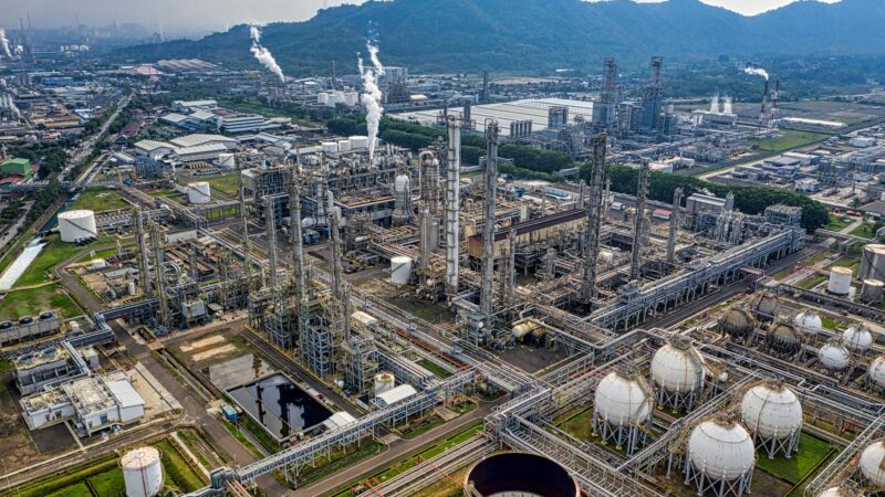 oil refinery complex aerial view crude oil pipeline tanker - Photo by Tom Fisk