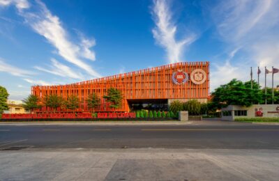Modern international school campus in Dubai with students and contemporary architecture