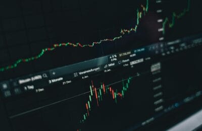 Bitcoin trading screen showing price decline in red with cryptocurrency market data
