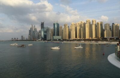 Dubai Marina skyline at sunset with residential towers