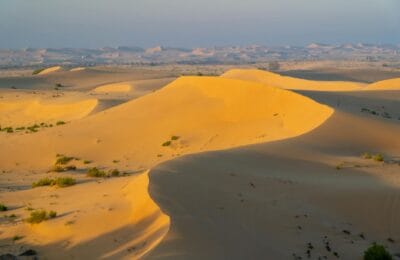 Vast desert sand dunes cinematic landscape Arrakis-like