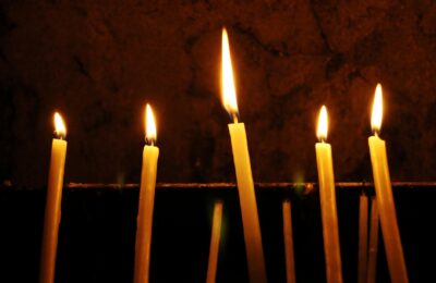 Lit candles inside a Middle Eastern church during Easter celebration 2026