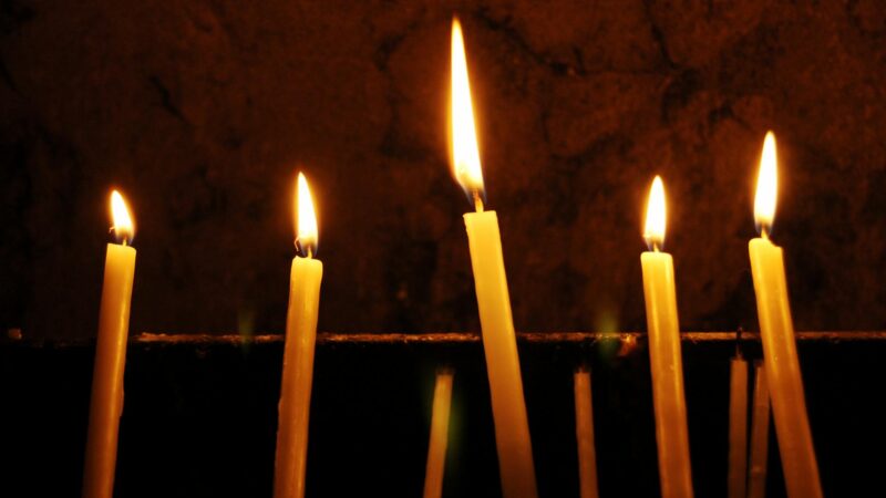 Lit candles inside a Middle Eastern church during Easter celebration 2026