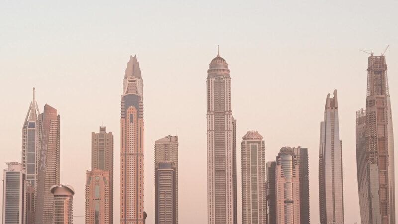 Modern Middle Eastern cityscapes representing the three competing economic transformation models of Egypt, Turkey, and Saudi Arabia