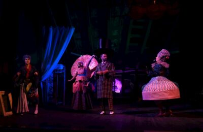 A dramatic scene from the Israeli TV series Fauda, depicting covert operatives in a tense Middle Eastern urban setting