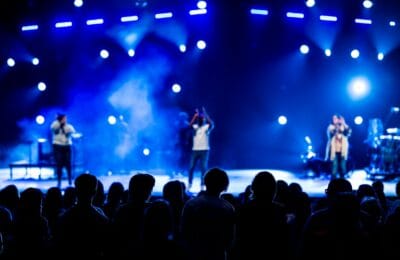 Excited audience watching a TV show premiere night - Fauda Season 5 Netflix 2026 announcement