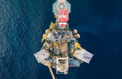 Offshore oil drilling platform representing global oil markets and Brent crude prices