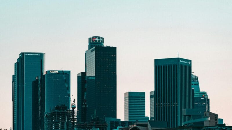 Modern banking district in Dubai with glass towers reflecting the skyline