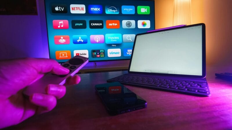 Modern living room setup for streaming Arabic content comparing Shahid Netflix and OSN+ platforms in 2026