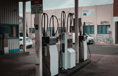 Cars at a gas station fuel pump in Dubai reflecting rising fuel prices in the UAE