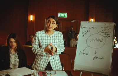 Arab businesswoman executive in a Dubai boardroom representing the rise of female-led Arab business empires
